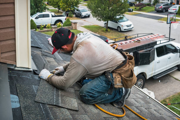 Professional Emergency Roof Repair technician working in Milton, NH